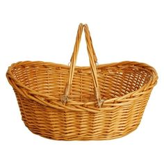 a wicker basket with handles on a white background