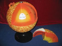 an orange and yellow object sitting on top of a table