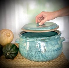 A big, beautiful casserole dish in elegant light blue, perfect for cooking and serving. This handmade ceramic pot is not only functional but also a stunning addition to your kitchen decor.  ITEM DETAILS * A light blue casserole dish. * Handmade with love with the utmost care and attention to detail. DIMENSIONS * Height: 5 in (11cm) * Diameter: 10in (26 cm) * Volume capacity: 4 liters PACKAGING AND SHIPPING * Ready to ship from Israel in 3-4 weeks * Securely packaged for safe delivery, with refun Ceramic Dutch Oven, Ceramic Casserole Dish, Clay Cooking Pot, Ceramic Casserole, Pot Ceramic, Rustic Centerpieces, Ceramics Pottery Art, Ceramic Pots, Ceramics Ideas Pottery