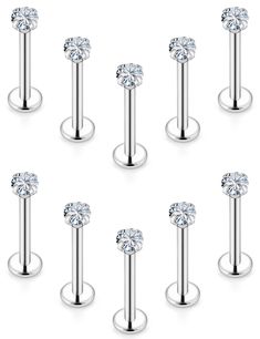 six pairs of surgical stainless steel barbells with clear crystal stones on each end