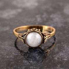 Moonstone ring, Vintage moonstone ring, brass moonstone ring, Statement ring, handmade ring, gift for her, gemstone ring, Halloween SIZE :- All Size Are Available, choose from variation. METAL :- Brass ❥ Customers satisfaction is our biggest priority, please contact us with any questions/queries for future or existing orders, and we will do our best to make sure you are happy with your order. ♥ Please Make Sure to Include The Correct Address During Before Order. You Can return Item within 30 Days After Successful Delivery. We Offer 100% Money Back Guarantee If You Not Satisfied With Your Purchase. Return Charge Will Be Paid By Buyer Only. This is my shop link https://www.etsy.com/in-en/shop/AustereGifts?ref=seller-platform-mcnav Thank you🥰 for shopping with us! Vintage Moonstone Ring, Handmade Moonstone Crystal Ring Gift, Gold Moonstone Crystal Ring, Handmade Moonstone Open Opal Ring, Adjustable Gold Moonstone Cabochon Ring, Gold Moonstone Ring As Gift, Gold Moonstone Ring For Gift, Bohemian Cabochon Moonstone Ring Gift, Handmade Gold Ring With Moonstone