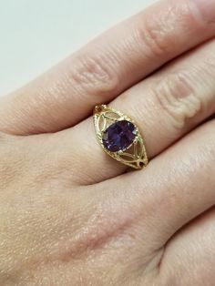 "Thanks for shopping our vintage estate store. We tend to sell well below wholesale and truly hope you enjoy all of our items. Many of the items are one of a kind, so please enjoy scrolling through the pictures and hopefully something will catch your eye. Spots are from reflections or camera. Estate 14k yellow gold created 1.5ct alexandrite cocktail filigree ring. The color of the gem is blue, purple to green with some pink, depending on light. No scratches on the gem. Stunning. Vintage setting,