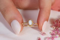 You can use it as a Opal Ring Gold 14K. Our Delicate Multicolor Opal Birthstone Stacking Ring is use as October Birth stone Band. This 10K 14K 18K Gold Colorful Gemstone Jewelry looks like 10K multicolor ring. Custom Personal Ring will be perfect gift for her as a mother. Dainty Birthmonth ring gift can be customized with your Birthstone or wedding month stone. We can turns it into a brilliant colorful opal ring. Our 18K bridesmaid ring is great multicolor accessory for her daily life. Its unique delicate ring exact matches with opal ring gold 14K. This stunning opal stacking ring symbolizes your love and serves as the ideal gift for your best friend, girlfriend, mom or grandmother. Please check our other birthstone rings: https://www.etsy.com/shop/minifinejewels?ref=seller-platform-mcnav& Stackable 14k Gold Opal Ring As Gift, 14k Gold Stackable Opal Ring For Gift, Stackable Opal Ring In 14k Gold For Gift, 14k White Gold Opal Ring As A Gift, 14k Gold Opal Halo Ring For Promise, 14k Gold Opal Ring With Halo Design For Promise, 14k Gold Opal Ring With Halo Design For Anniversary, 14k Yellow Gold Opal Ring With Halo, Delicate Gold Oval Opal Ring