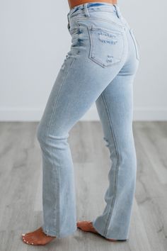 Details: Elizabeth Vervet Jeans High Rise Intentional Distressing Raw Edge Frayed Hems Fading/Whiskering Good Stretch Slim Bootcut Fit Available in Light Wash Rise: 9.5" Inseam: 31" Leg Opening: 16" Material: 93% Cotton, 5% Polyester, and 2% Spandex We are recommending true to size! Vervet Jeans, Stylish Boots, Curvy Jeans, Comfortable Flats, Shoes With Jeans, Good Stretches, Raw Edge, Swimwear Tops, High Jeans