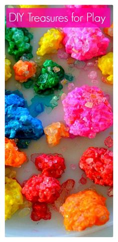 colorful gummy bears sitting on top of a white plate with text overlay that says diy treasures for play