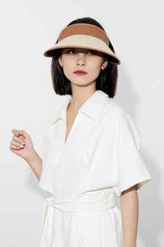 Stay effortlessly chic and protected with our adjustable UPF 50 wide-brim straw sun visor. Made with 100% paper straw and cotton-linen, it offers breathable comfort and stylish sun protection. Perfect for sunny days and outdoor adventures. Sunset Yellow, Black Backless Dress, Tank Top Skirt, Sun Visor Hat, Desert Sunset, Visor Hat, Silk Knit, Silk Wool, Dress Hats