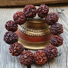 📿This Bracelet is handcrafted with Nepali 5 Mukhi Rudraksha Beads. The 5 Mukhi Rudraksha (Five Faced Rudraksha ) is one of the most popular forms of rudraksha that symbolises prosperity and success in life. It is known for releasing the person from all kinds of unwanted bonds in life and fulfils the desires of the wearer over time. This rudraksha balanced all the chakra points. This five Mukhi Rudraksha is known as the most powerful rudraksha among all rudraksha. This Rudraksha is also known as Handmade Mala For Puja During Navratri, Handmade Mala For Navratri Gift, Handmade Mala Gift For Navratri, Handmade Mala For Festivals As A Gift, Handmade Mala For Festivals And Gifts, Handmade Mala For Festivals Gift, Traditional 8mm Beaded Bracelet, Traditional 8mm Bead Bracelet, Traditional 8mm Bead Bracelet Jewelry