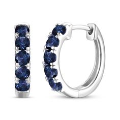 These petite hoop earrings from the Natural Precious Gemstones by KAY collection are a striking choice. Crafted in 10K white gold, each earring features five beautiful round-cut blue sapphires. These earrings secure with hinged backs.