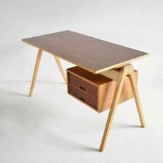 a wooden desk with two drawers on one side and an open drawer on the other