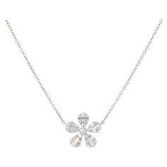 18k White Gold 0.41ctw Pave Diamond Flower Necklace Material: 18k White Gold Diamond Details: There are approximately 0.41 carats of Round Brilliant and Baguette cut Diamonds. All diamonds are approximately G/H in color and approximately SI in clarity Chain Details: Lobster Clasp Total Weight: 3.2g (2.0dwt) Length: Chain is adjustable and can be worn at 15in, 16in or 17in Additional Details: This item comes with a presentation box! SKU: G13292 Luxury Necklaces With Pave Setting And Flower Pendant, Diamond Flower Necklace, Push Present, White Gold Chain, Baguette Cut Diamond, Diamond Flower, Baguette Cut, Drop Necklace, Fine Jewellery Necklace