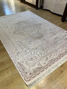 a large rug on the floor in a room