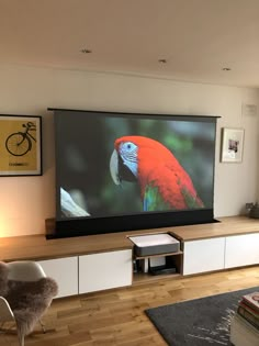 a flat screen tv mounted on the wall in a living room