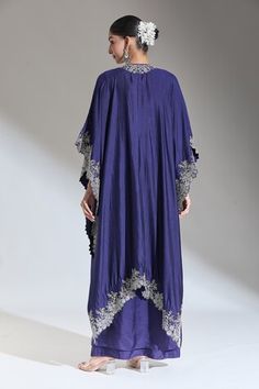 Purple asymmetric hem cape with floral zardozi embroidered borders. - Aza Fashions Silk Cape Kaftan, Traditional Kaftan With Cape Sleeves For Reception, Traditional Dress With Zari Work And Cape, Embroidered Kaftan With Cape Sleeves For Party, Festive Kaftan With Embroidered Border, Festive Kaftan With Dupatta Cape, Festive Kaftan With Cape Dupatta, Party Kaftan With Embroidered Cape Sleeves, Elegant Festive Kaftan With Embroidered Border