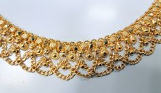 "22K Solid gold fully handmade Anklet. Length-10\" ( we can adjust length), width-1.7 cm, weight-40 Grams. Material -22K Solid Gold Hallmarked." Gold Anklets With Tilla For Puja, Gold Anklets For Puja And Festivals, Traditional Gold Anklets With Adjustable Fit, Traditional Gold Toe Ring Anklets, Traditional Gold Adjustable Anklets, Traditional Gold Anklets Adjustable, Traditional Gold Anklets With Latkans, Gold Temple Jewelry Anklet For Festive Occasions, Traditional Gold Anklet For Puja