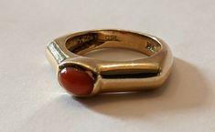 Vintage Coral And 14k Gold Ring Circa 1970s/ 80s Weighs 4.2 Dwt or 6.6g Ring size 6¾ Great condition 80s Rings, 70s Rings, 1970s Rings, Vintage Coral Jewelry, Vintage Orange Ring Jewelry, Red Coral Ring, Vintage Orange Cabochon Rings, 14k Gold Ring, Costume Design