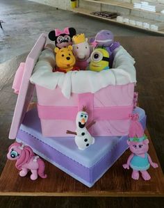 there is a cake that looks like it has many stuffed animals in it