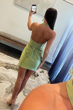 This cocktail dress features a Bodycon silhouette with a Sage green satin material that creates a polished and elegant look. The Halter neck with a keyhole top adds a touch of sophistication, while the Ruched skirt details and an open back add a modern and stylish touch. SKU: 3631 Satin material Sage color Bodycon silhouette Halter neck keyhole top Ruched skirt Open back Highly suggest custom size for plus size. Ship in 7-10 business days. We offer free returns in 7 days. Please refer to our return policy page for more details. If you have any questions, don't hesitate to contact us: at service@dressesforparty.com. Skirt Details, Keyhole Top, Ruched Skirt, Sage Color, Mini Cocktail Dress, Green Satin, Satin Material, Elegant Look, Halter Neck