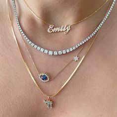 This unique personalized script font nameplate cut-out necklace is composed of 14K solid gold and beautifully pavé set with genuine AAA quality natural real light pink sapphires. This pendant is complemented by a durable 14K solid gold adjustable chain or can be purchased as a charm alone without the chain under the "Length" drop-down menu. NOTE: The item will be made in the exact casing of the characters entered. Please be mindful of this detail when providing the customization desired. Name Di Rose Gold Round Tennis Necklace As A Gift, White Diamond Nameplate Jewelry, Personalized Diamond Necklace Fine Jewelry, Dazzling Personalized Cubic Zirconia Necklaces, Dazzling Personalized Cubic Zirconia Necklace, Personalized Diamond Necklace With Round Pendant, Fine Jewelry Yellow Gold Charm Necklaces With Cubic Zirconia, Fine Jewelry Yellow Gold Cubic Zirconia Charm Necklaces, Engraved White Gold Necklace With Cubic Zirconia