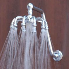 a shower head with water flowing from it and the caption says, now my showerhead feels inferior