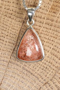 Sunstone Pendant Approx. Dimensions: 22x20x6 mm This pendant is made with .925 Sterling Silver. Chain is not included. Sunstone is a beautiful and unique feldspar mineral known for its shimmering and sparkling appearance. It belongs to the same mineral family as moonstone and labradorite, and it's valued for its warm colors and intriguing optical effects. Sunstone is primarily composed of a variety of feldspar known as oligoclase, often with the presence of hematite or goethite inclusions that c Silver Sunstone Jewelry As A Gift, Silver Sunstone Jewelry For Gift, Spiritual Sunstone Jewelry As A Gift, Spiritual Sunstone Jewelry For Gift, Sunstone Gemstone For Jewelry Making, Sunstone Gemstone Jewelry As Gift, Sunstone Gemstone Jewelry For Jewelry Making, Silver Sunstone Jewelry With Natural Stones, Silver Mineral Crystal Gemstones As Gifts