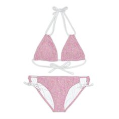 Adorable swimsuit with the rosy pink ditsy floral designed by Paula. Made with 4-way stretch Tricot (82% Microfiber, 18% Spandex), this strappy bikini set is the perfect companion to all swimming and beach adventures.  .: Material: 82% microfiber polyester, 18% spandex .: Medium fabric (7.5 oz /yd² (250 g/m .: Two piece swimsuit .: 7 strap colors to choose from .: Adjustable elastic straps .: Removable cups .: Assembled in the USA from globally sourced parts .: Seam thread color automatically matched to design (black or white) Designed and assembled in the USA Adjustable Swimwear For Spring, Pink Swimwear With Adjustable Straps For Summer, Strappy Swimwear For Spring Sunbathing, Pink Strappy Swimwear, Adjustable Pink Swimwear For Pool, Adjustable Strappy Swimwear For Spring, Pink Strappy Swimwear For Swimming, Pink Adjustable Strappy Swimwear, Pink Swimwear With Adjustable Straps For Pool