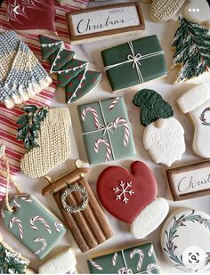 christmas cookies and other holiday treats on a table