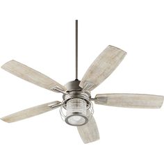 a ceiling fan that is on top of a white wall