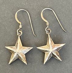 Vintage Sterling earrings Vintage Handmade Star Jewelry, Classic Silver Star-shaped Jewelry, Sterling Silver Star Earrings In Silver, Vintage Silver Jewelry With Star Charm, Handmade Silver Star Earrings, Silver Star-shaped Earrings With Ear Wire, Silver Star-shaped Pierced Earrings, Bohemian Silver Star Earrings, Vintage Handmade Star-shaped Jewelry