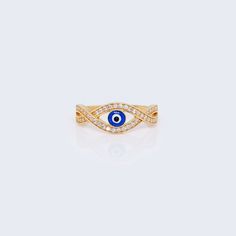 Elevate your style with our 14K Gold Infinity Evil Eye Ring. Featuring a mesmerizing evil eye design adorned with sparkling CZ stones, this ring is truly one-of-a-kind. Crafted from luxurious 14K gold, it symbolizes eternal protection and adds a touch of sophistication to any outfit. Step into the world of elegance and luxury. Details: Metal: 14K Gold Face Size(mm): 7 Item #: 14KWR1-40 Elegant Evil Eye Rings, Elegant Evil Eye Rings As Gift, Round Cubic Zirconia Ring With Diamond Eyes, Luxury Details, Evil Eye Design, Gold Face, Evil Eye Ring, Yellow Stone, Eye Ring