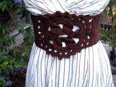 "This beautiful chocolate brown crochet corset belt will be the highlight of any outfit. If you have a boring dress that needs a little (or a lot) of pizzaz, I think you may have found the right accessory! This belt would also look great with a flowing bohemian outfit. Due to the fact that it is corseted in the back, the size can be adjusted to a larger length.This belt is so pretty, and so much fun to make, I hope you will want one in every color! Measurements: Length: 26 inches, 66 cm (can adj Ren Faire Crochet, Crochet Corset Belt, Crochet Chocolate, Crochet Corset, Bohemian Outfit, Crochet Belt, Hippie Crochet, Brown Crochet, Confection Au Crochet