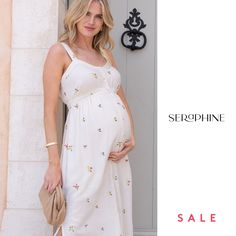 Seraphine's embroidered button-down midi dress features a cool, comfy silhouette in a flexible fit and the prettiest flower motif, perfect to see you through those spring-summer days in effortless style. Sleeveless Midi Dress With Floral Embroidery For Daywear, Sleeveless Floral Embroidery Midi Dress For Daywear, Summer Cotton Maternity Dress Nursing Friendly, Casual Midi Dress With Floral Embroidery For Spring, Casual Midi Dress With Floral Embroidery For Daywear, Chic Spring Maternity Dress Nursing Friendly, Spring Floral Embroidery Midi Dress For Daywear, Spring Midi Dress With Floral Embroidery For Daywear, Casual Summer Nursing Friendly Dresses