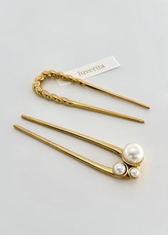 Elevate your hair game with these 18K Gold-Plated Hair Forks. These elegantly designed accessories will add a touch of sophistication to your look.    Measurements: Pearl Hair Fork * 10 cm long & 2.2 cm wide    Measurements: Twisted Hair Fork * 10 cm long & 3.1 cm wide    Product Details * Material: 18k Gold Plated  * Material: Premium Stainless Steel * Hypoallergenic, suitable for sensitive skin * Waterproof & Sweatproof Checkout our other listings by visiting our store https://www.etsy.com/de-en/shop/Luvertta Minimalist Hair Accessories, Hair Forks, Twisted Hair, Minimalist Hair, Dyi Gifts, Hair Fork, Wedding Accessory, Hair Stick, Ponytail Holder