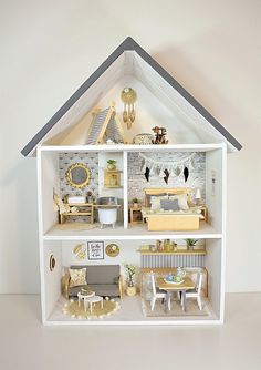 a doll house with furniture and accessories in it's display case on the wall