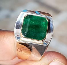 Watch video here: https://youtu.be/oy8TZ2IHB1o Natural Unheated Untreated beautiful Swat Rich green dark Emerald Rich Green Beautiful Color Stone weight : 7.30 Carats Stone shape is emerald cut Stone has natural inclusions but not broken Highest Quality Emerald Premium 925 Sterling Silver Ring size 10 US Resize able as per buyer choice Premium Quality Engagement Ring Anniversary Ring Shipping option is FedEx Three working days Handling Time Lowest Price ever for this kind of Big emerald. Contact Emerald Cut Emerald Ring With Vvs Clarity, Formal Green Sapphire Ring With Vvs Clarity, Green Emerald Signet Ring For Wedding, Green Emerald Signet Ring With Gemstone, Green Emerald-cut Signet Ring For May Birthstone, Green Emerald Signet Ring Fine Jewelry, Green Emerald Cut Signet Ring For May Birthstone, Green Gemstone Signet Ring For Anniversary, Formal Green Emerald Signet Ring