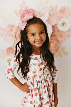 Indulge in the sweetness of style with Swoon Baby Girls Candy Hearts Eyelet Dress. This adorable dress features an all over candy heart print, paired with an eyelet trim, making every twirl a moment of joy. Shop now for the perfect valentines dress! Sizing: Swoon Baby fits true to size. Playful Pink Twirl Dress For Playdate, Playful Pink Long Sleeve Twirl Dress, Pink Long Sleeve Playful Twirl Dress, Fun Pink Twirl Dress For Playtime, Cute Fitted Twirl Dress For Playtime, Long Sleeve Playful Twirl Dress For Playdate, Playful Long Sleeve Twirl Dress For Playdate, Cute Pink Dress For Valentine's Day, Cute Pink Valentine's Day Dress