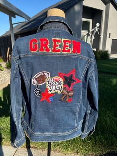 Sport Mom Patch Denim Jacket.  Great way to show support of your athlete.  These denim jackets are customizable, we can work together to create your special piece.  All school colors available. Diy Patch Denim Jacket, Denim Patches Diy, Upcycle Jean Jacket, Patch Jean Jacket, Denim Varsity Jacket, Patch Denim Jacket, Jean Jacket Patches, Patch Clothing, Diy Denim Jacket