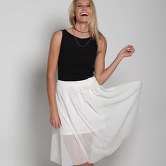 High-Waisted Midi Skirt. Mesh Fabric. Back Zip Closure. Model Is 5'9" / 175 Cm., Wears A S. Content: 100% Polyester; Lining: 100% Polyester Care: Dry Clean Skirt Length: 26" / 66 Cm. Casual White Maxi Skirt For Party, Chic White Stretch Maxi Skirt, White Pleated Skirt For Summer Party, White Knee-length Fitted Pleated Skirt, White Fitted Knee-length Pleated Skirt, White Midi Skirt For A Day Out, White Gathered Maxi Skirt For Day Out, White Flowy Skirt For Spring, White Pleated Mini Skirt For Summer