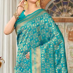 Turquoise colored saree is made from banarasi silk fabric which is highlighted with beautiful floral weaving work as shown. comes along unstitched banarasi silk blouse piece which you can customise as per your design/style. Occasion - You can buy this saree for festive and functions. Note:- The actual product may differ slightly in color and design from the one illustrated in the images when compared with computer or mobile screen. Measurements: Saree : Banarasi Silk : 5.5 Mtrs Blouse : Banarasi Turquoise Zari Weaving Saree, Turquoise Handloom Traditional Saree, Unstitched Turquoise Saree, Turquoise Handloom Saree For Festivals, Turquoise Art Silk Saree With Self Design, Traditional Turquoise Saree With Zari Weaving, Turquoise Saree With Cutdana For Puja, Turquoise Traditional Wear With Zari Weaving For Festivals, Turquoise Diwali Saree With Zari Weaving