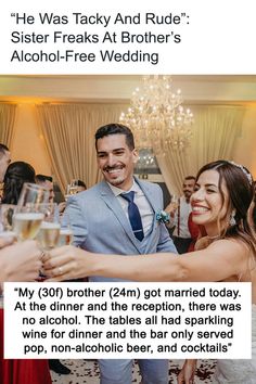 a man and woman are toasting at their wedding