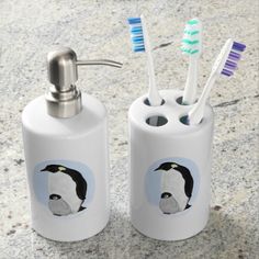 two toothbrush holders with bats on them