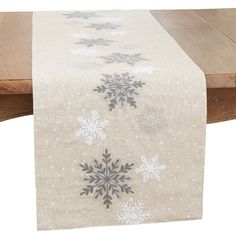 Embrace the enchantment of winter with this Snowflakes Table Runner. Delicately adorned with intricate snowflake designs, it adds a touch of seasonal charm to your table. Crafted with care, this runner sets the stage for cozy gatherings and creates a festive and inviting atmosphere. Welcome the beauty of the season with this exquisite snowflakes table runner. Winter Table Runners, Snowflake Table Runner, Winter Table Runner, Paper Snowflake Template, Intricate Snowflake, Modern Holiday Decor, Winter Table, Burlap Table Runners, Needle Point