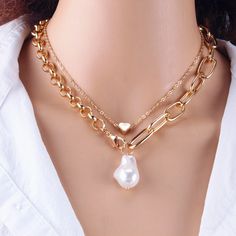 📍 Product Overview: Classy & Timeless: The necklace showcases a pearl, symbolizing purity and elegance. Durable Material: Made of zinc alloy, ensuring longevity and resistance to tarnish. Versatile Design: Suitable for both daily wear and special occasions. Secure Link Chain: The link chain is sturdy and offers a comfortable fit, ensuring the pendant stays in place. Color Options: Choose between classic gold or sleek silver to best match your style. Specifications: Item Type: Pendant Necklace M Alloy Pearl Chain Necklace For Gift, Pearl Chain Necklace In Alloy As Gift, Alloy Pearl Necklace As A Gift, Metal Pearl Necklace With Chain For Gifts, Metal Chain Pearl Necklace For Gift, Pearl Necklace With Metal Chain For Gifts, Pearl Necklace With Alloy Chain As Gift, Gift Pearl Necklace With Metal Chain, Pearl Necklace With Chain For Gifts