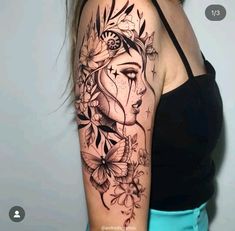 a woman's face with flowers and butterflies on her arm