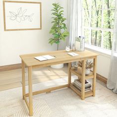 a computer desk in front of a window with a potted plant next to it