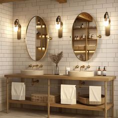 a bathroom with two sinks and three mirrors on the wall next to eachother