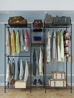 an organized closet with clothes and suitcases