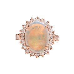 7.10 Carats Natural Impressive Australian Opal and Diamond 14K Solid Rose Gold Ring Amazing play of colors opal. Pictures don't show the beauty of the opal. Total Natural Opal Weight is: Approx. 6.00 Carats Opal Measures: Approx. 14.00 x 11.50mm Natural Round Diamonds Weight: Approx. 1.10 Carats (color G-H / Clarity SI1-SI2) Ring size: 7.5 (we offer free re-sizing upon request) Ring total weight: 6.2 grams SKU #1233 Zsa Zsa Gabor, Ring Rosegold, Crystals Jewelry, Etsy Gold Ring, Solid Gold Rings, Beauty Inspo, Australian Opal, Shiny Things, Natural Opal