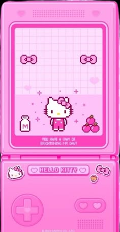 an old style pink game console with hello kitty on the screen