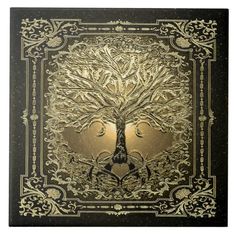 a golden tree on black and gold paper