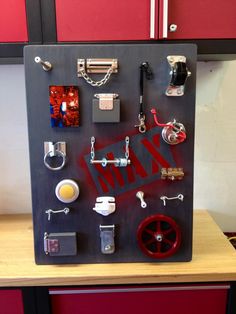 an assortment of assorted items displayed on a black board with red lettering that says fix